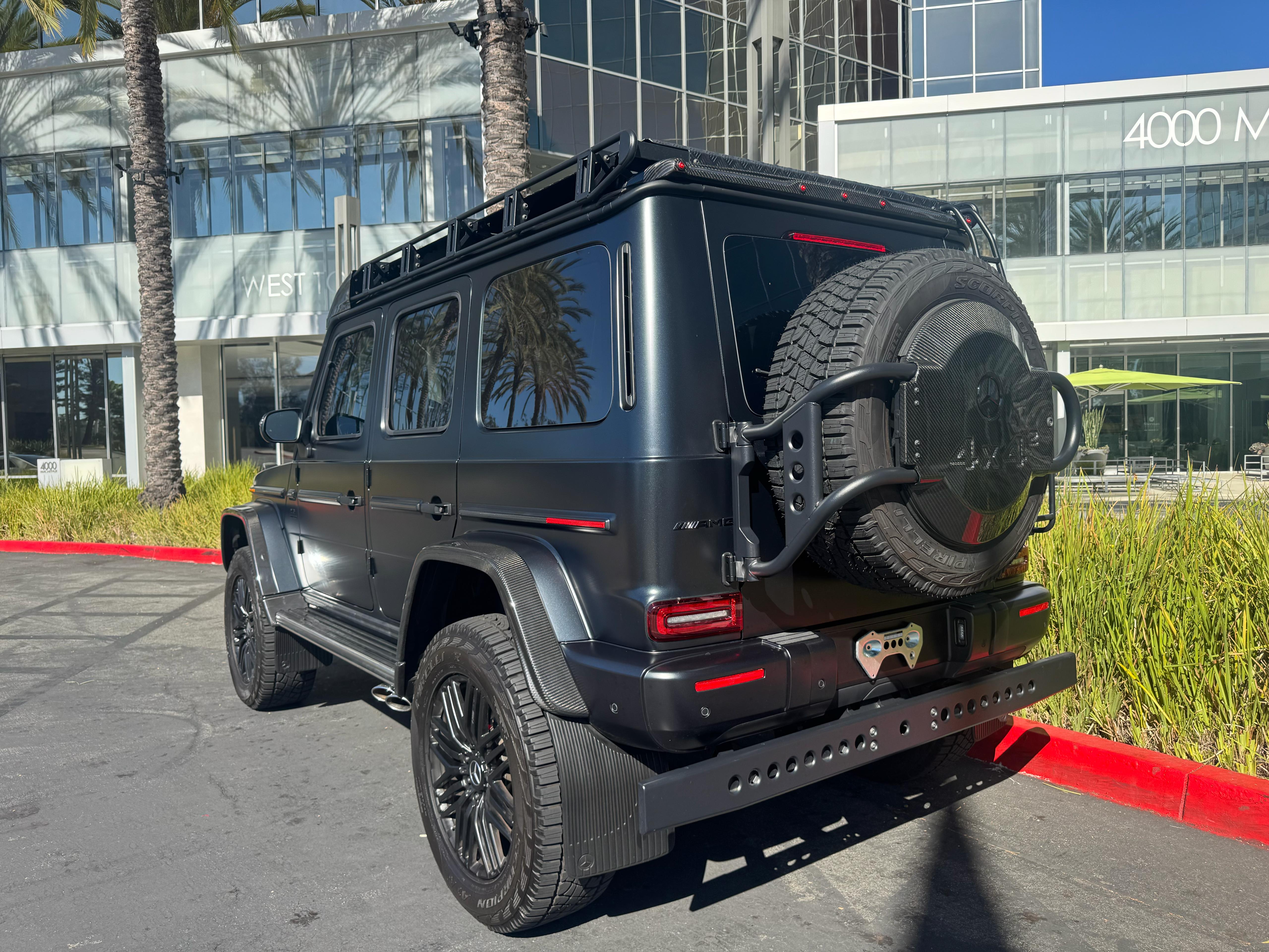 Luxury exotic SUV parked outside dealership ready to sell online